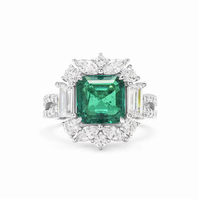 front view of Emerald engagement ring with moissanite halo in silver