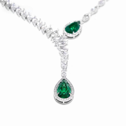 Necklace with two pear green zircon