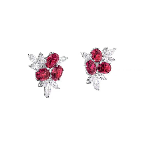 side view of Oval red zircon silver earrings with marquise accent