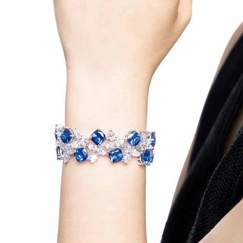 lady wearing Blue and white zircon fancy silver bracelet