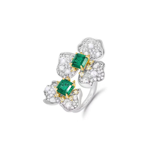 side view of Emerald engagement ring with yellow pavé