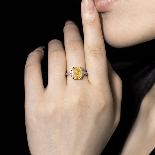 lady wearing Three stone yellow zircon engagement ring 