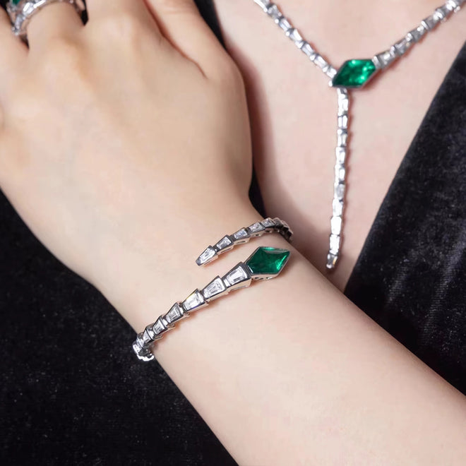 lady wearing Snake bangle with created emerald In silver