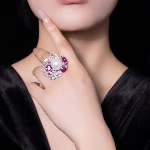 lady wearing Pearl cocktail ring with pink zirconia in silver