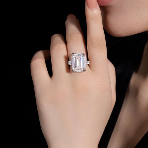 lady  wearing Engagement Ring With Emerald Cut White Zircon Statement Ring Silver