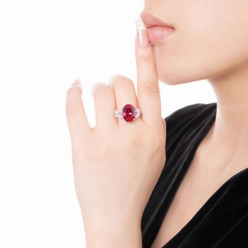 lady wearing Three-stone zircon engagement ring in silver