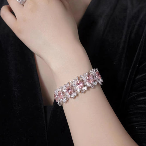 lady wearing Oval pink zirconia fancy silver bracelet