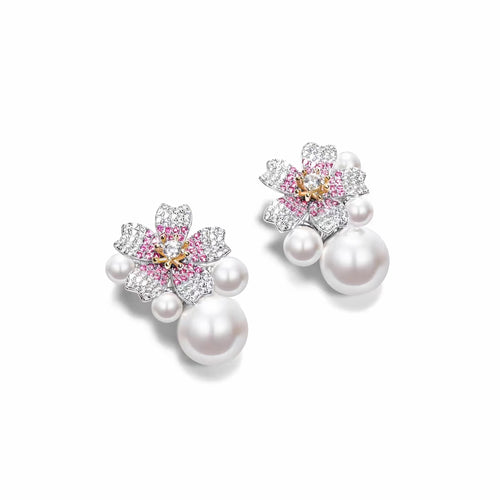 side view of Silver floral pearl earrings with moissanites