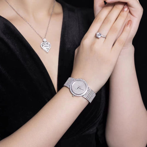 lady wearing Wrist watch bracelet with zirconia in silver