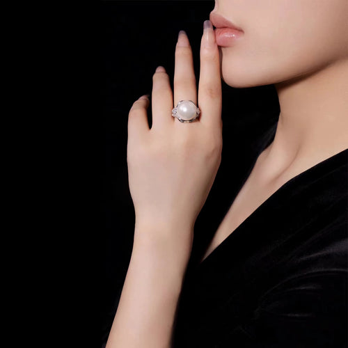 lady wearing White pearl silver statement ring