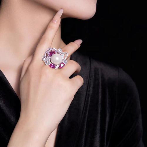 lady wearing Pearl cocktail ring with pink zirconia in silver