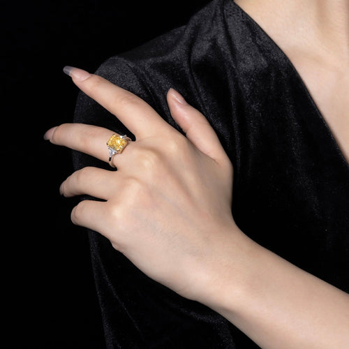 lady wearing Three stone yellow zircon engagement ring 