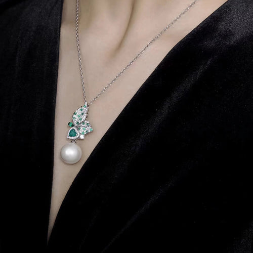 lady wearing White pearl silver necklace with green zircon