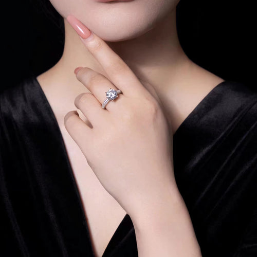 lady wearing a prong set round zircon diamond ring