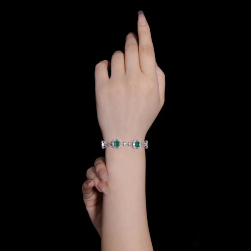 lady wearing Silver emerald bracelet with zircons