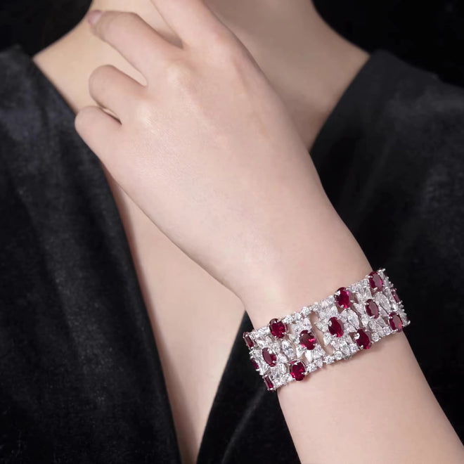 lady wearing Red oval zircon silvere bracelet  