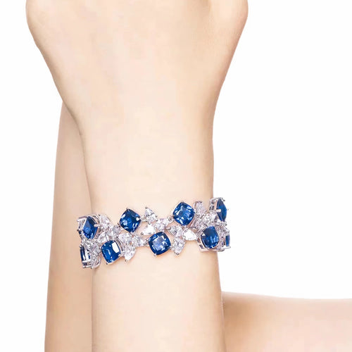 lady wearing Blue and white zircon fancy silver bracelet