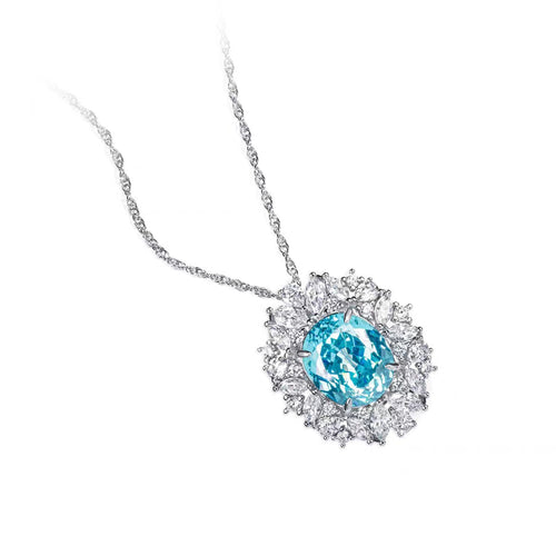 side view of Ocean blue cubic zirconia necklace with halo in silver