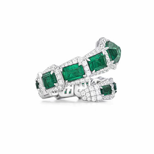 Green zircon ring in snake design