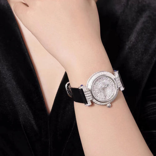 lady wearing Wrist watch bracelet with zirconia in silver and leather band