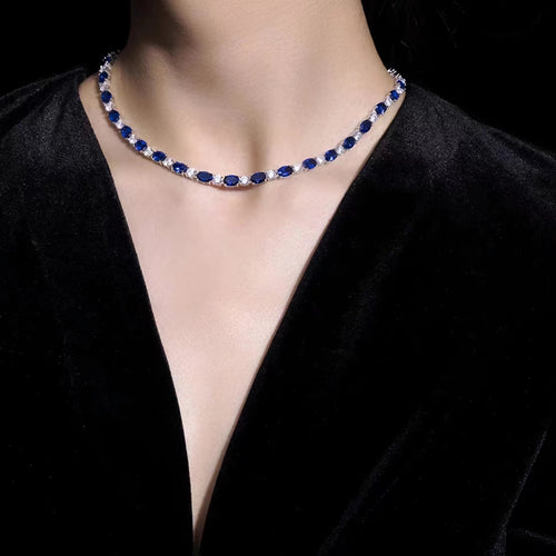 lady wearing Blue cubic zirconia alternating necklace in silver