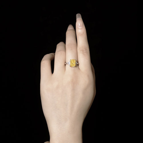 lady wearing Three stone yellow zircon engagement ring 