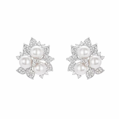 front view of Pearl silver earrings with moissanites 