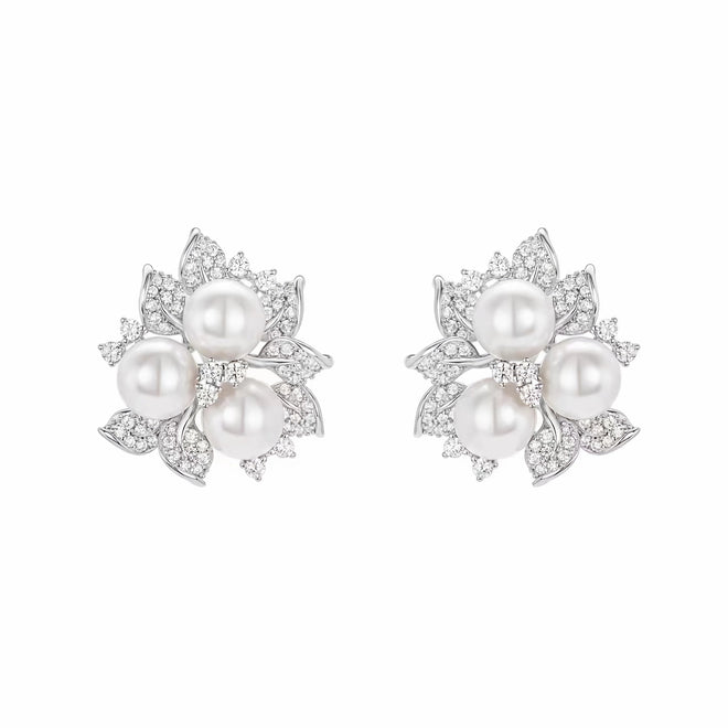 front view of Pearl silver earrings with moissanites 