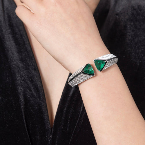 lady wearing Trillion green zircon silver bangle