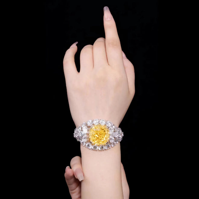 lady wearing Yellow cushion zircon fancy bracelet