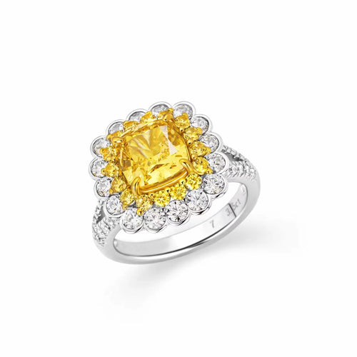 profile view of Yellow zircon halo engagement ring in silver