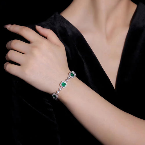 lady wearing Silver emerald bracelet with zircons