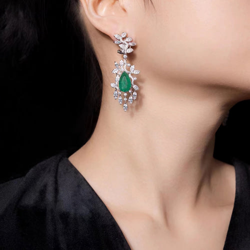 lady wearing Green cubic zirconia drop earrings in silver