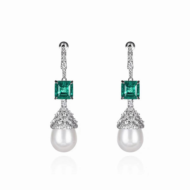 Pearl drop earrings with square green zircons