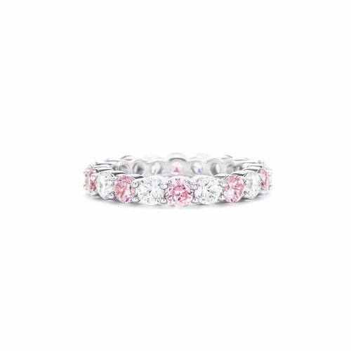 Front view of Alternating round pink and  white zircon silver ring