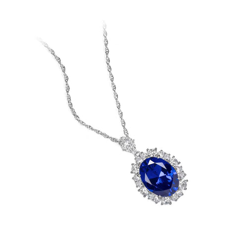 side view of Blue cubic zirconia halo necklace in silver