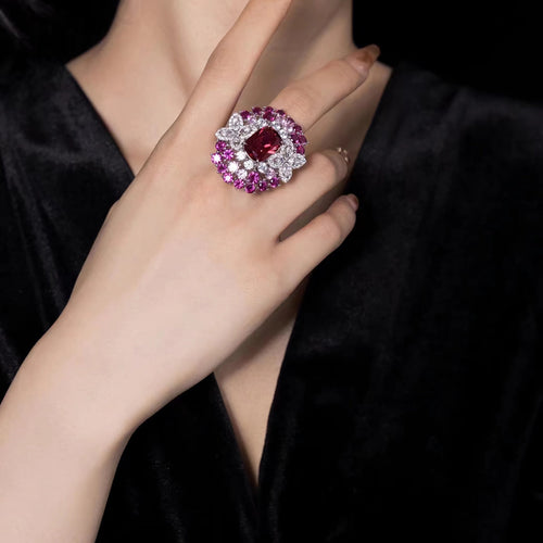 lady wearing Red zircon fancy silver statement ring  