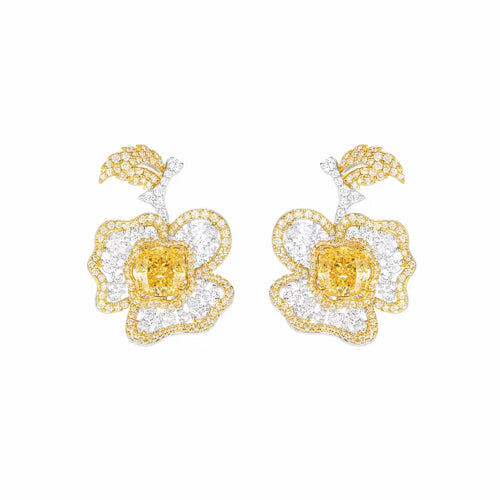 front view of Yellow zircon silver floral drop earrings with moissanites