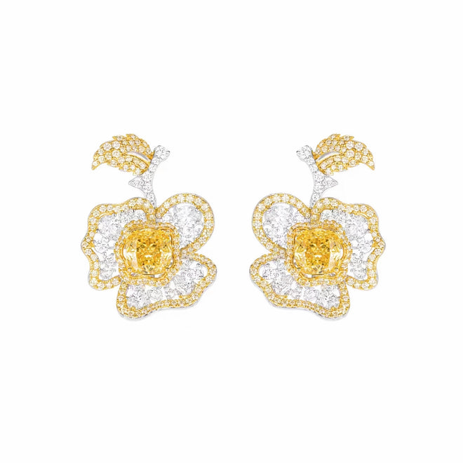 front view of Yellow zircon silver floral drop earrings with moissanites