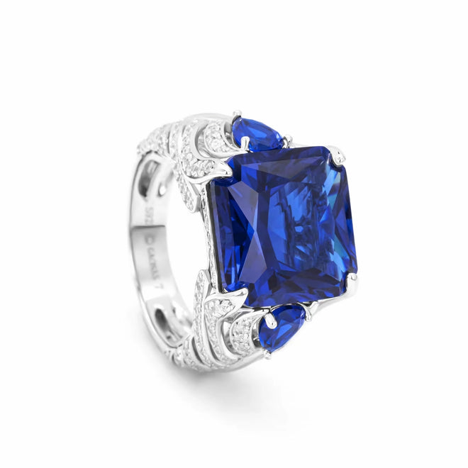 side view of Radiant blue zircon three stone engagement ring