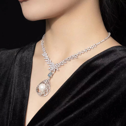 lady wearing Fancy white pearl necklace with cubic zirconia