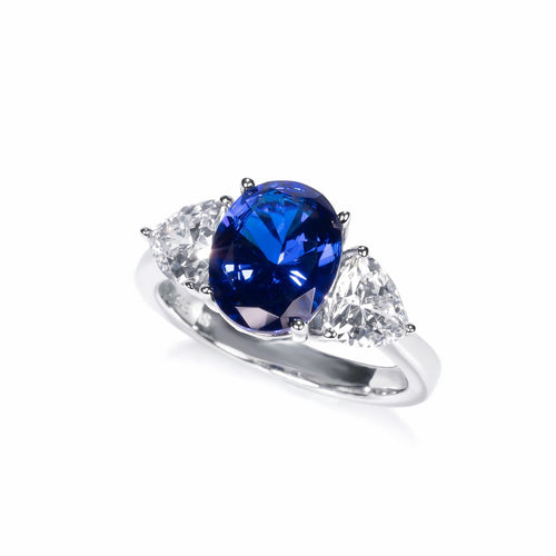 side view of Created blue sapphire ring with moissanites