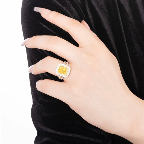 lady wearing Radiant yellow zircon halo cocktail ring in silver