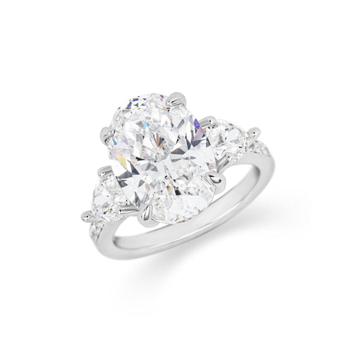 profile view of Three stone oval cubic zirconia engagement ring in silver