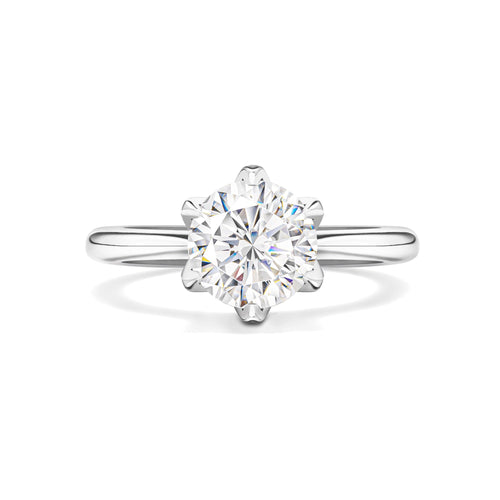 Round halo solitaire engagement ring in silver