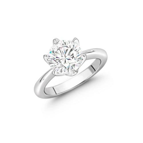 profile view of Round halo solitaire engagement ring in silver