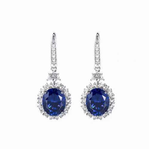 front view of Silver blue zircon drop earrings with moissanite halo 