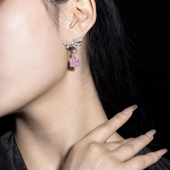 lady wearing Pink cubc zirconia earrings in silver