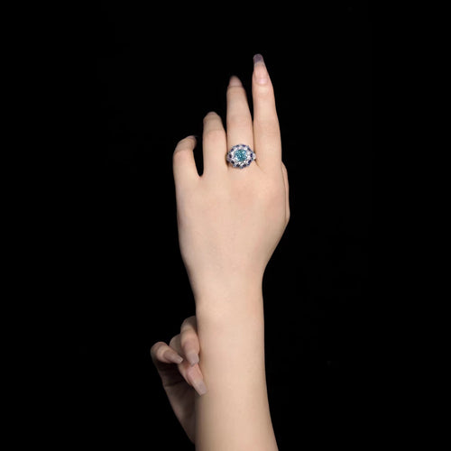 lady  wearing Blue zircon fancy silver statement ring  