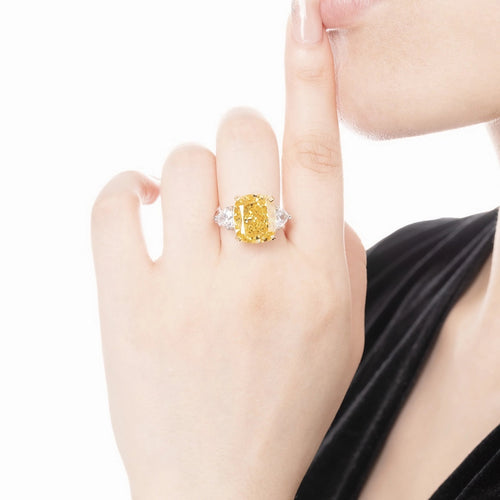 lady wearing  Three stone yellow zircon silver engagement ring